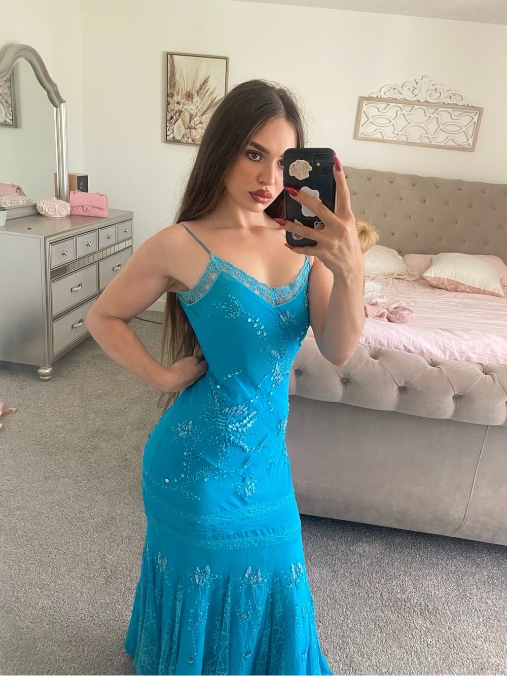 Chica’s Turquoise Lace-Trim gown